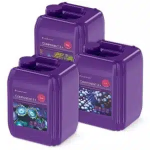 Three purple Aquaforest component jugs for aquarium use.